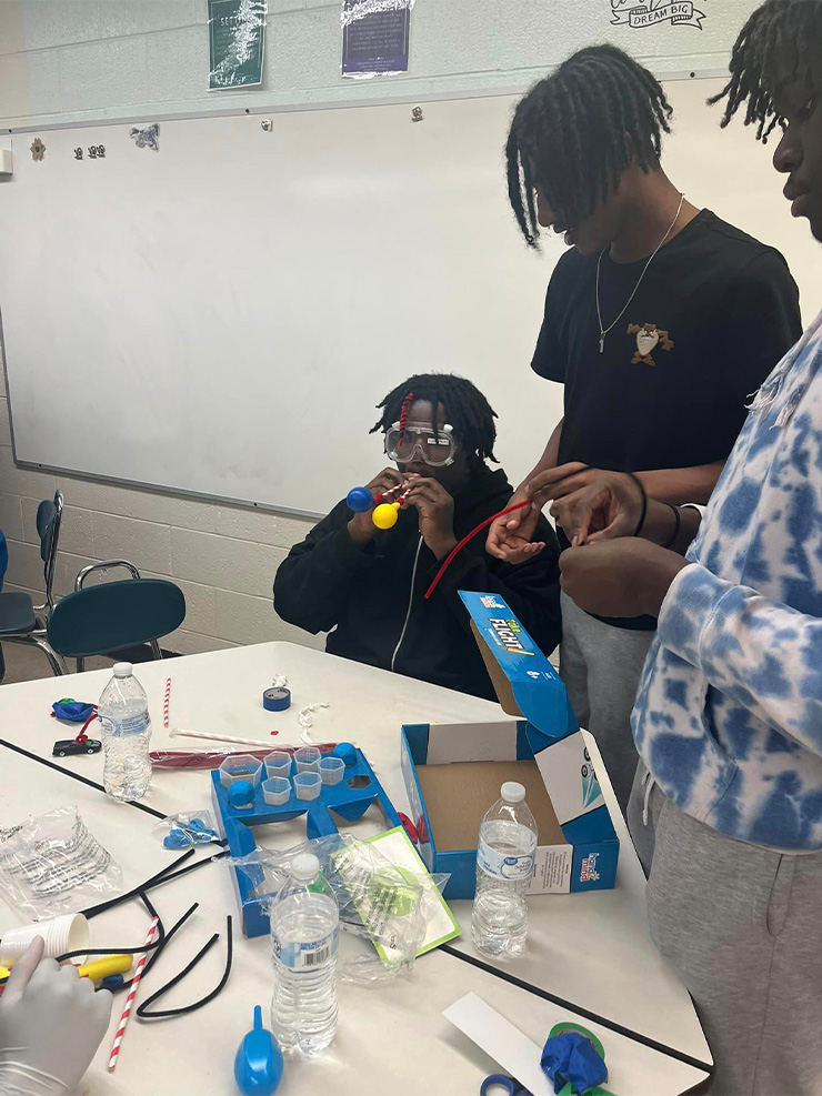 Upward Bound students perform science experiments