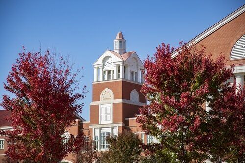 clock tower with fall foliage