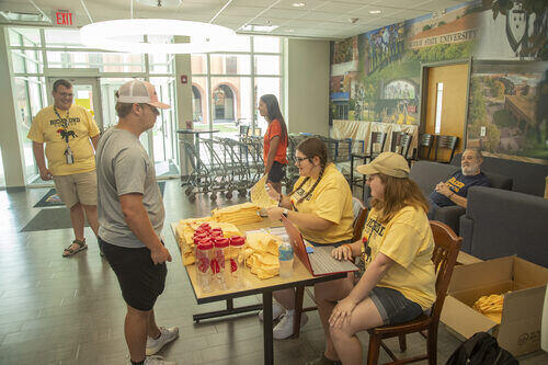 student check-in at their new dorm